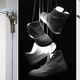 Illustration for article titled A Lamp That Looks Exactly Like Sneakers Tossed Over Power Lines